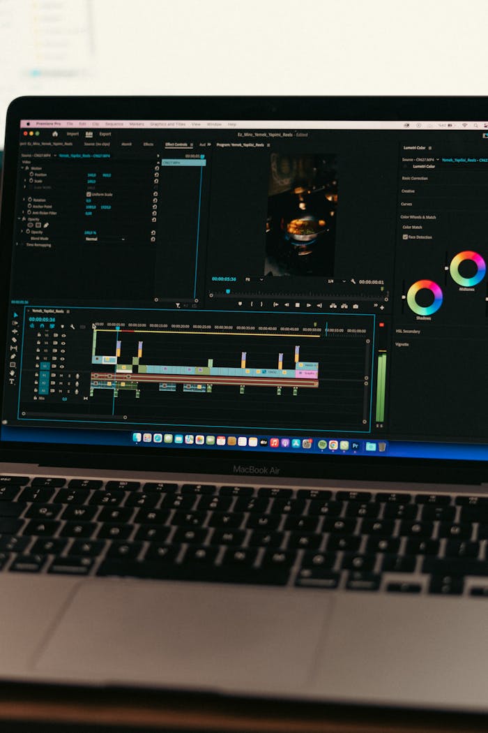 services-01 MacBook Air displaying video editing software interface, ideal for technology and digital content themes.