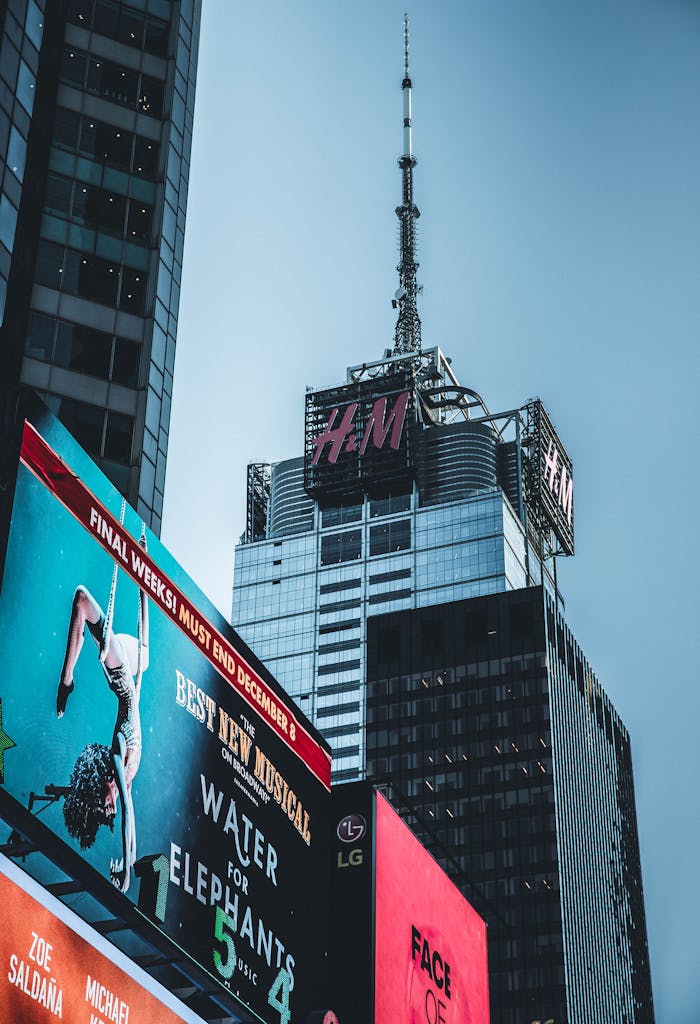 Dynamic view of Times Square with towering billboards and skyscrapers in New York City.